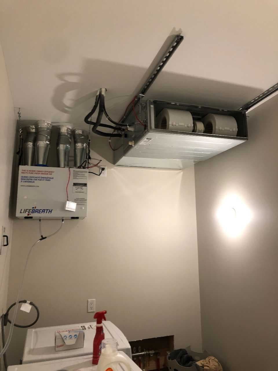 HRV unit with low-profile ductless indoor unit (pancake style)