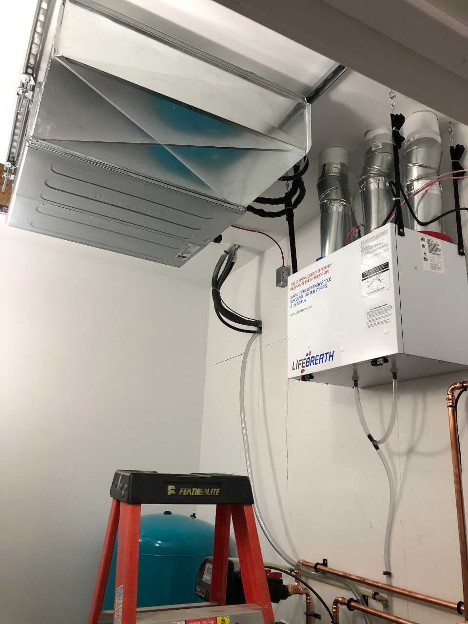 Ceiling cassette or pancake-style ductless indoor unit