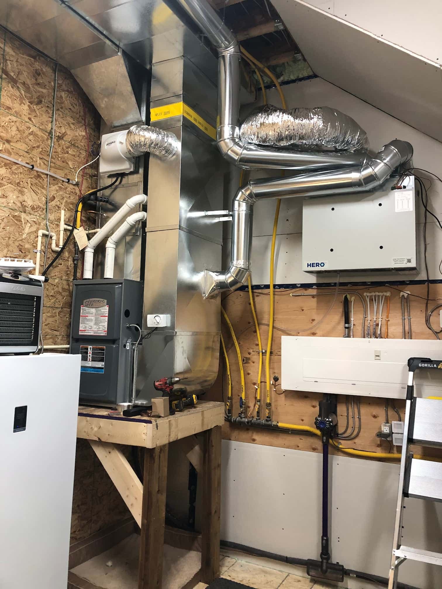 Suspended gas-fired unit heater in a garage or commercial bay